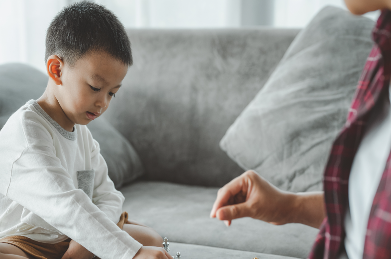 Kid playing chess