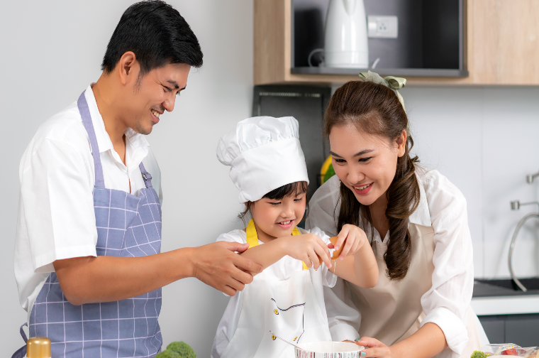 young-asian-love-family-are-preparing-food-dinner-on-table-in-the-kitchen-which-father-and-mother